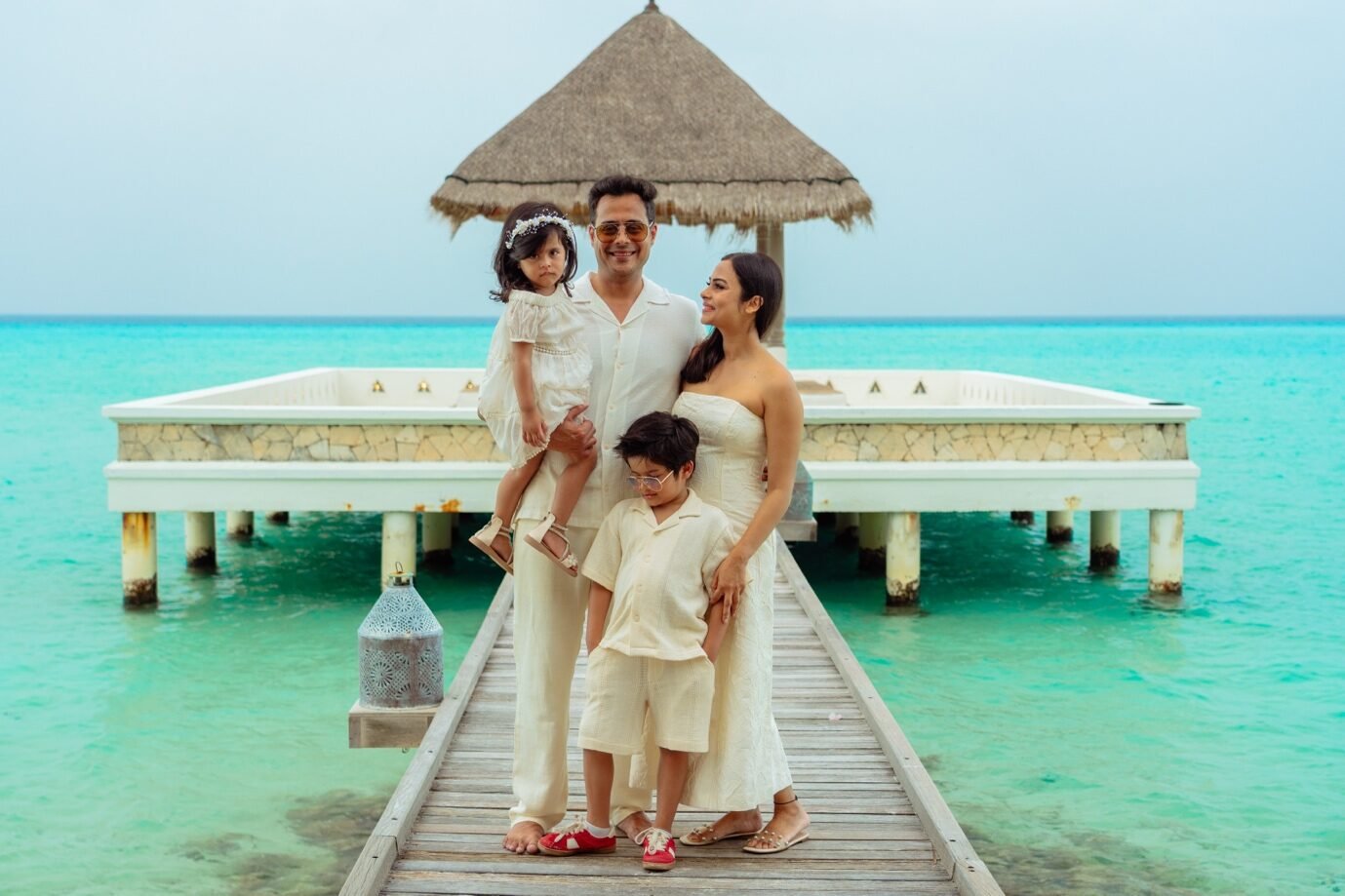 Family on a private Maldives jetty