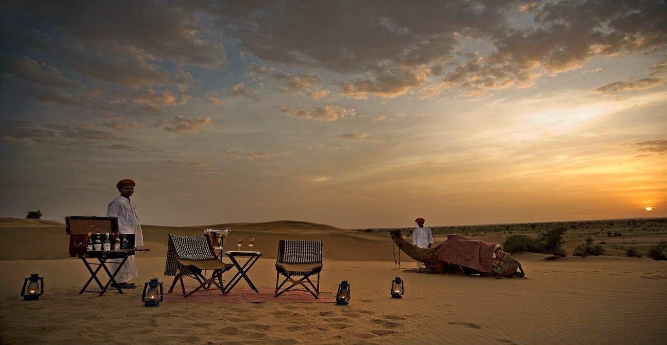 Private sunset dinner staged on the Rajasthan dunes