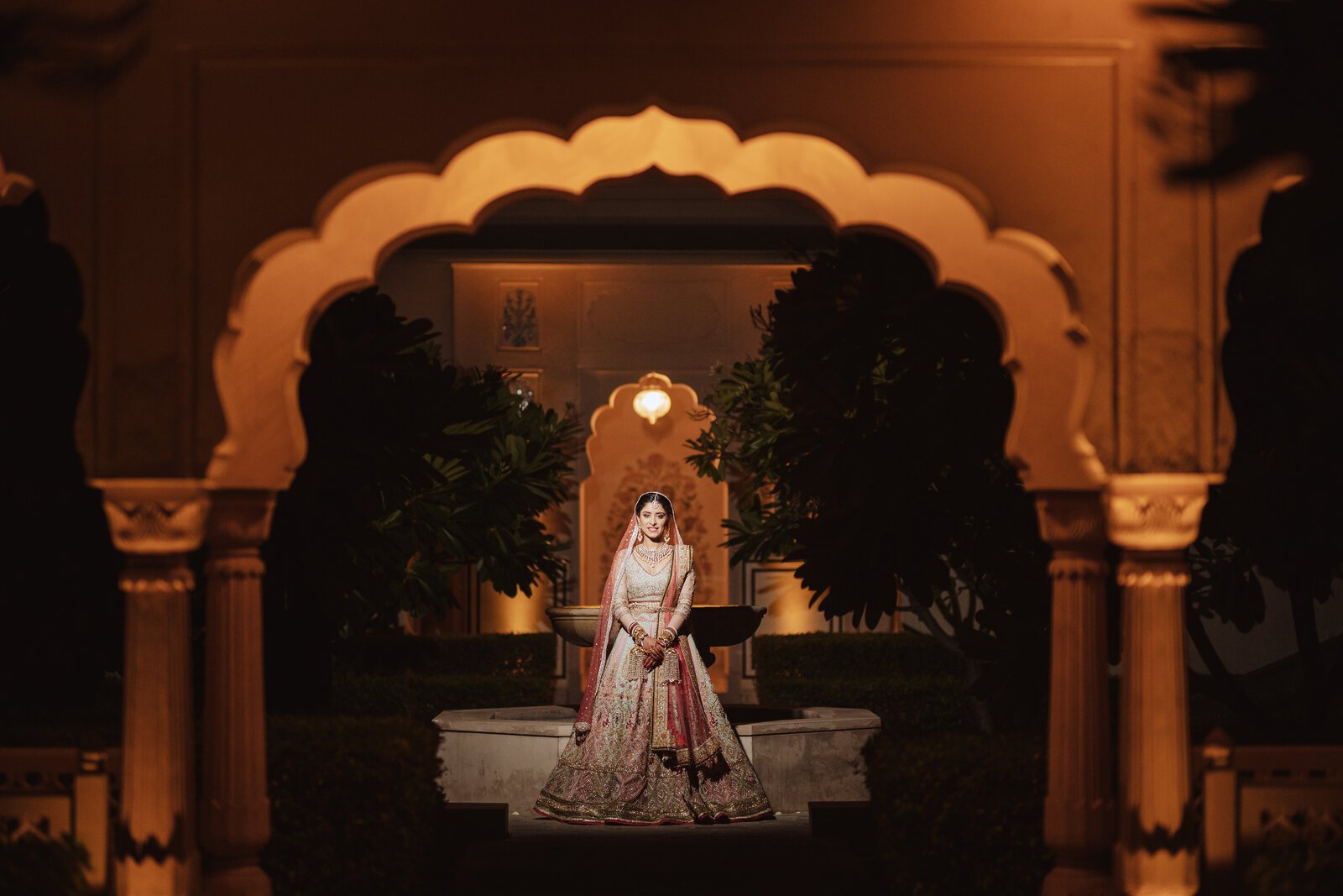 Floral mandap under palace arches