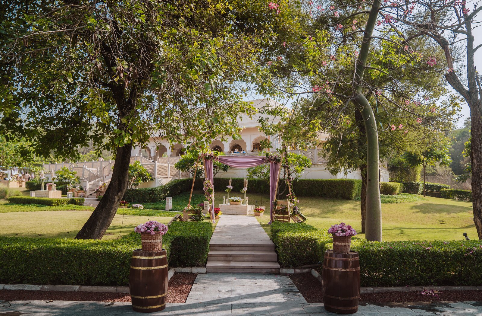 Palm-lined heritage haveli courtyard at golden hour